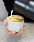 Cappuccino mug Fundament in light grey speckled and white by Archive Studio, filled with cappuccino by Barista Essentials