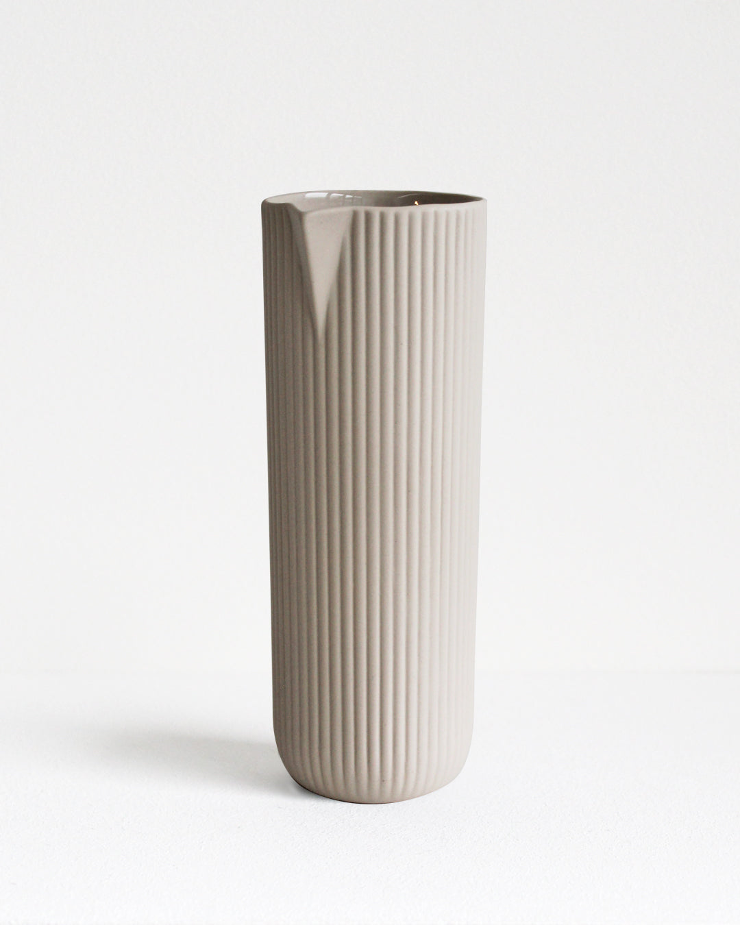 Column carafe in sand, handmade stoneware with glazed interior and unglazed exterior, Archive Studio