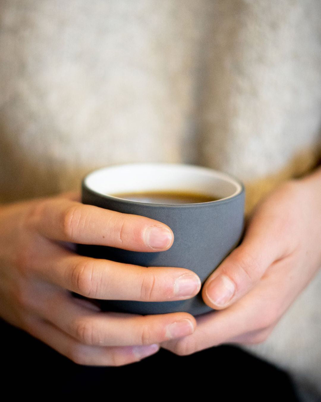 Fundament cappuccino mug in dark grey and white by Archive Studio, sleek and stylish