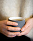 Fundament cappuccino mug in dark grey and white by Archive Studio, sleek and stylish