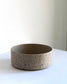 Forme Collection stoneware bowl in sand and speckled finish, glazed inside and unglazed outside, handmade, minimalist design
