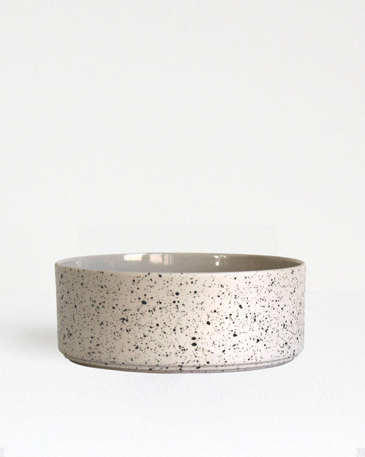 Forme Collection stoneware bowl in sand and speckled finish, glazed inside and unglazed outside, handmade, minimalist design