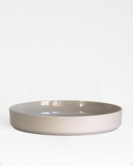 Forme Collection large stoneware bowl in sand finish, glazed inside and unglazed outside, handmade, minimalist design
