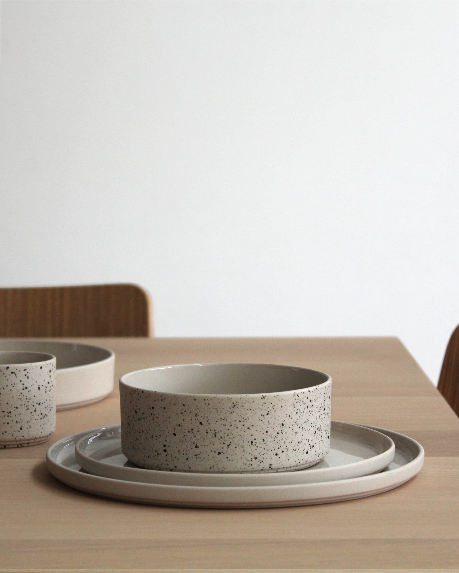 Close-up of Forme Collection small plate showing sand finish and texture