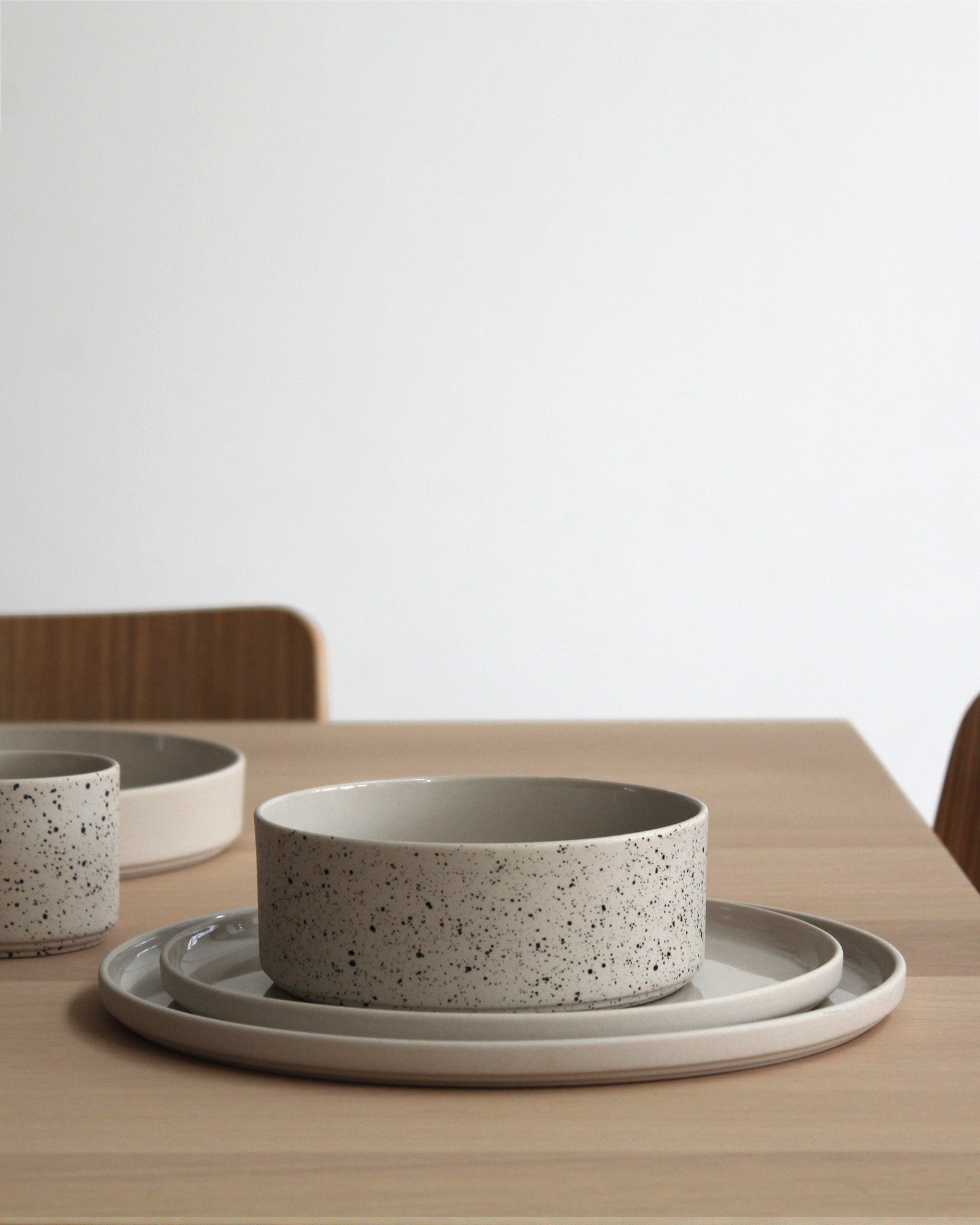 Close-up of Forme Collection small plate showing sand finish and texture