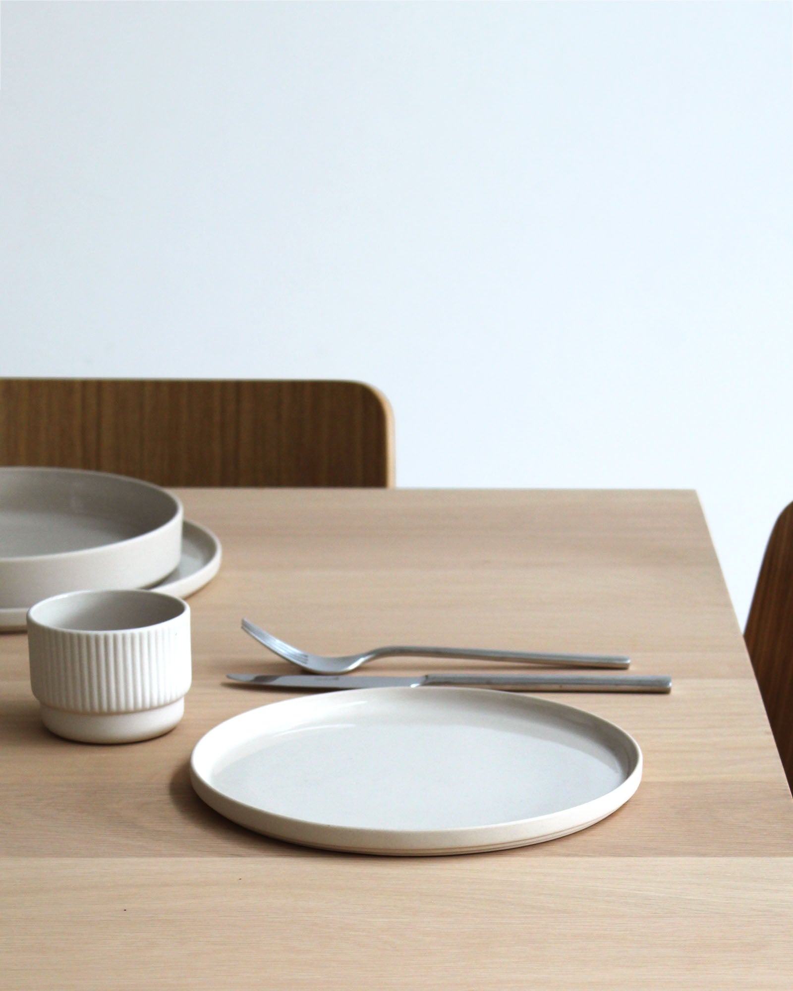 Forme Collection small stoneware plate in sand tone, top view