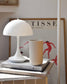 Tall Column mug in sand on a table setting, handmade stoneware with glazed interior and unglazed exterior, Archive Studio