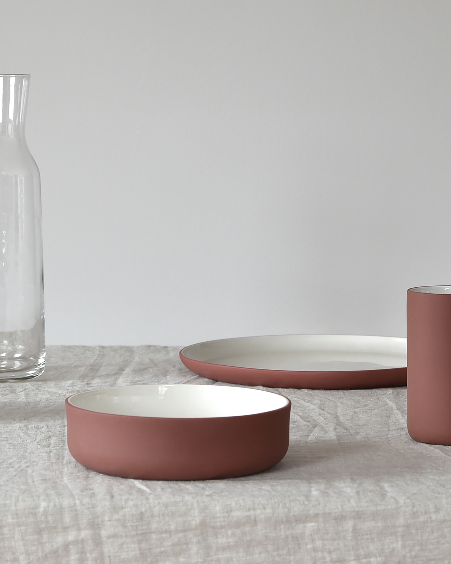Terracotta and white bowl by Archive Studio, modern and timeless design
