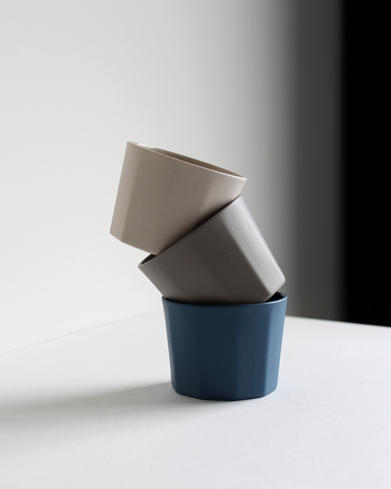 Blue ,light grey and sand Segmented cappuccino mug with glazed interior and textured exterior