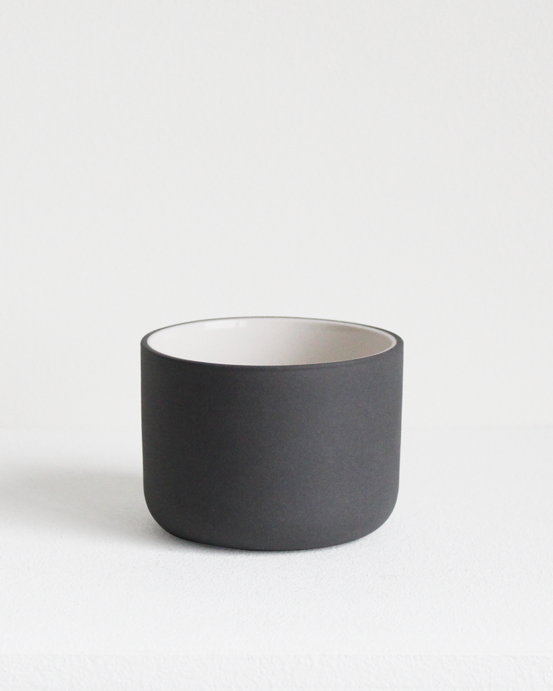 Cappuccino mug Fundament in dark grey and white by Archive Studio with minimalist design