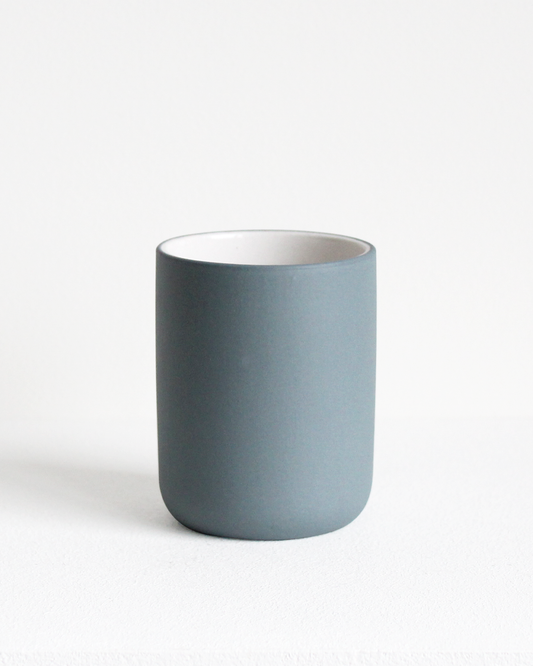 Coffee mug Fundament in teal and white by Archive Studio with minimalist design