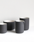 Minimalist dark grey/white Cappuccino mug Fundament by Archive Studio on table