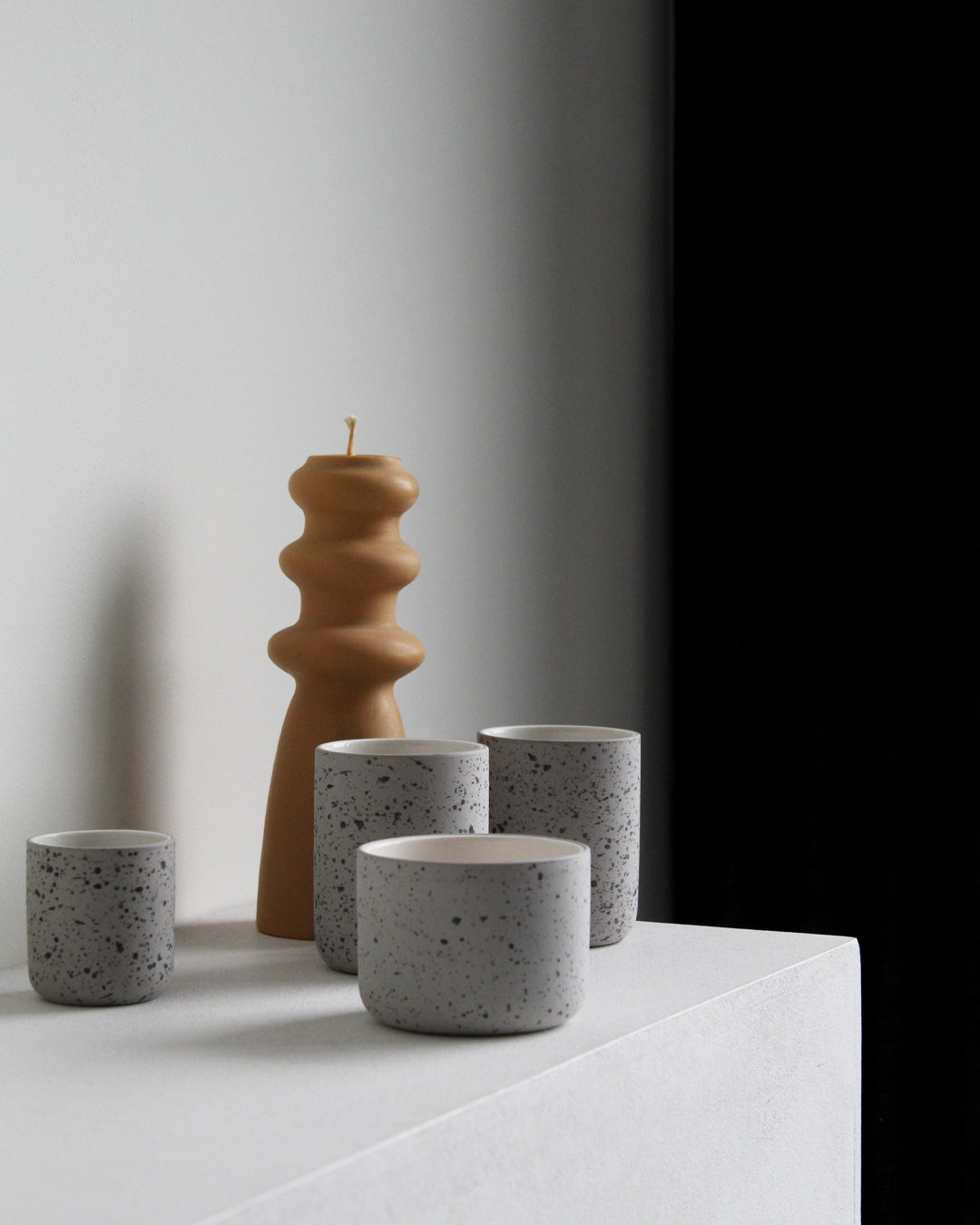 Minimalist light grey speckled/white Cappuccino mug Fundament by Archive Studio on table