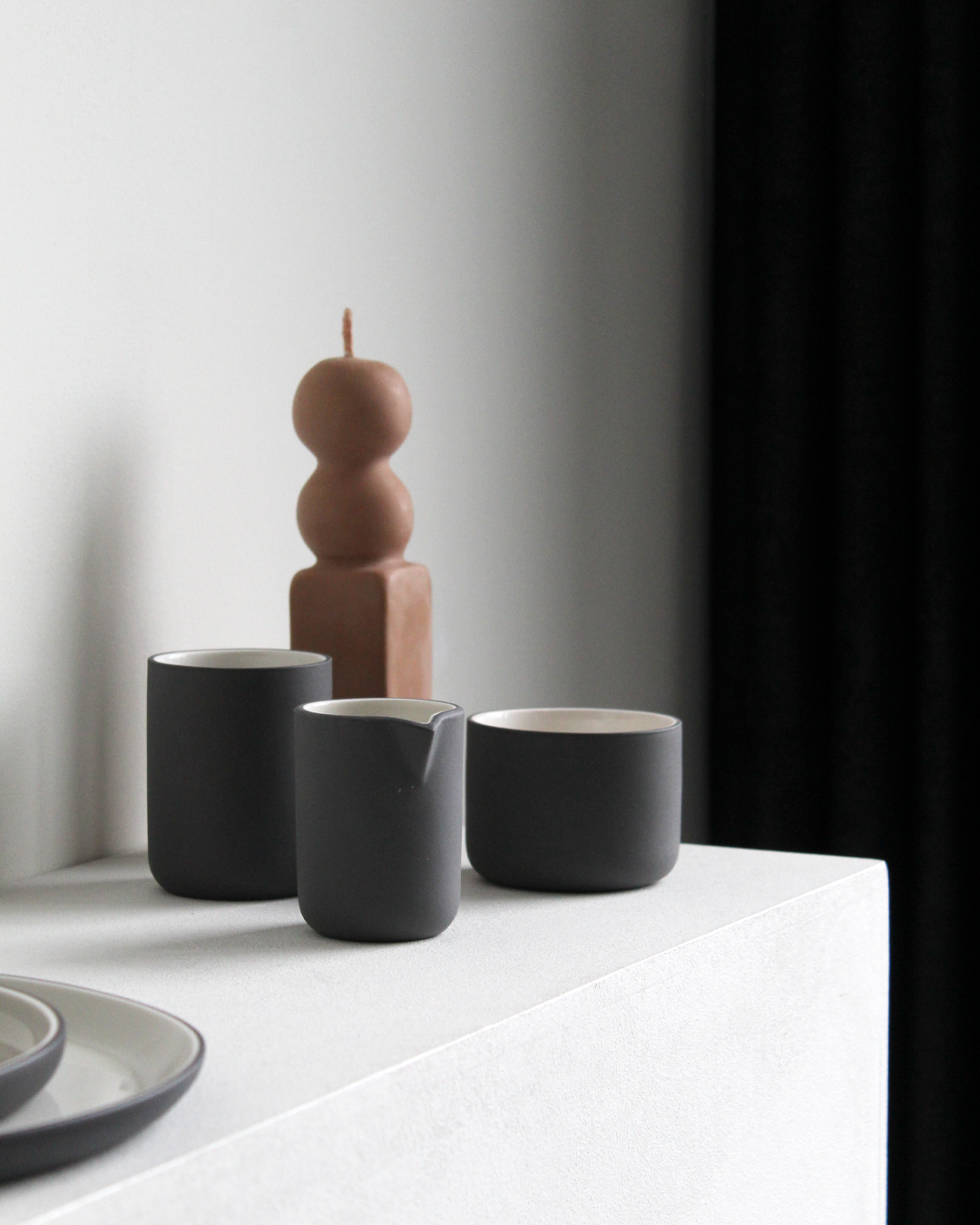Dark grey and white Cappuccino mug Fundament filled with cappuccino by Archive Studio
