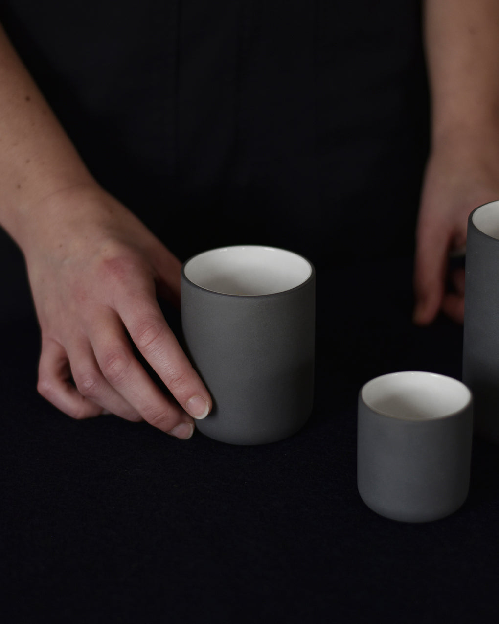 Minimalist dark grey/white Espresso cup Fundament by Archive Studio on table