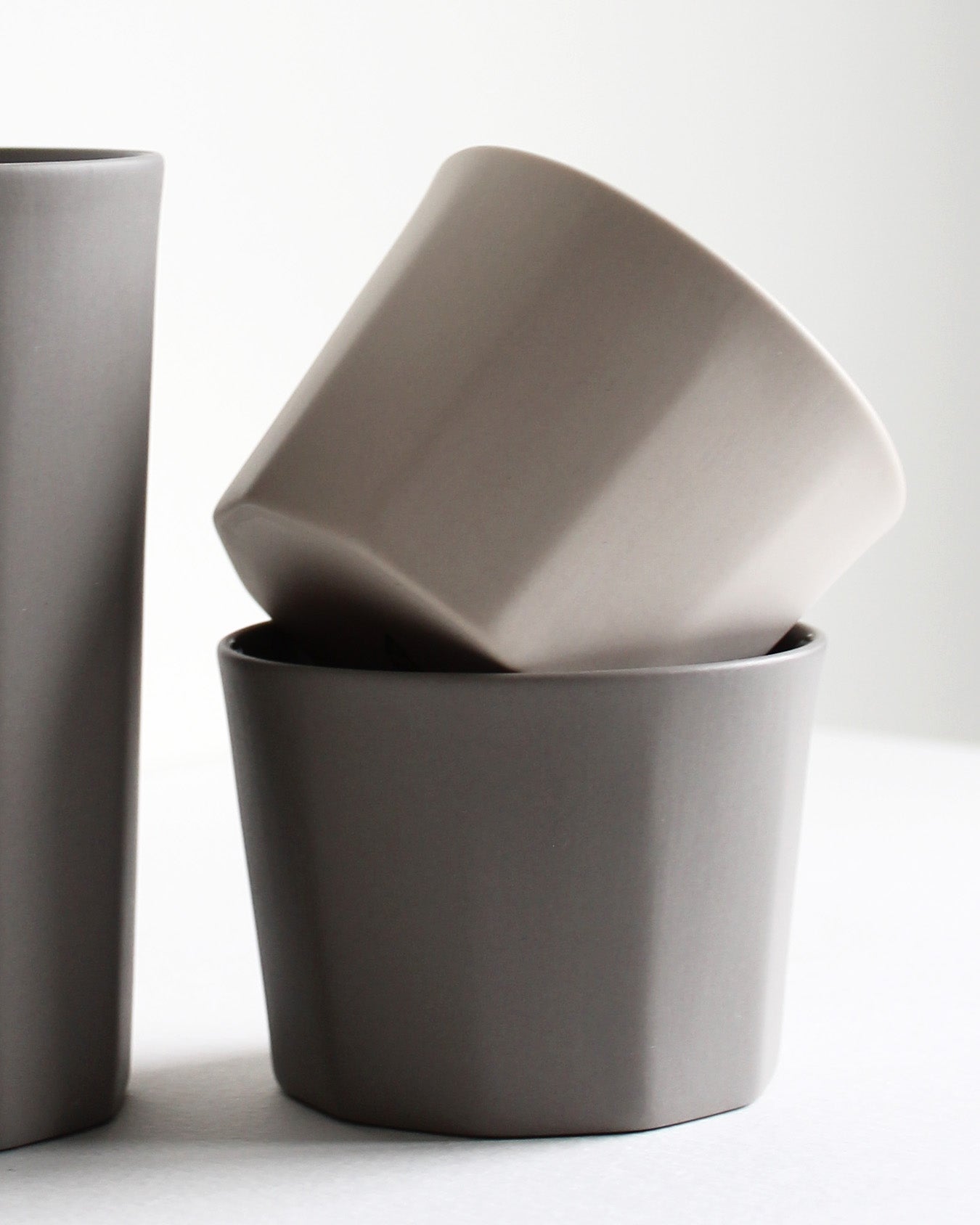 Light grey stoneware cappuccino mug Segmented collection in neutral setting