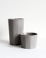 Tall ceramic mug Segmented in light grey with minimalist design and matte texture